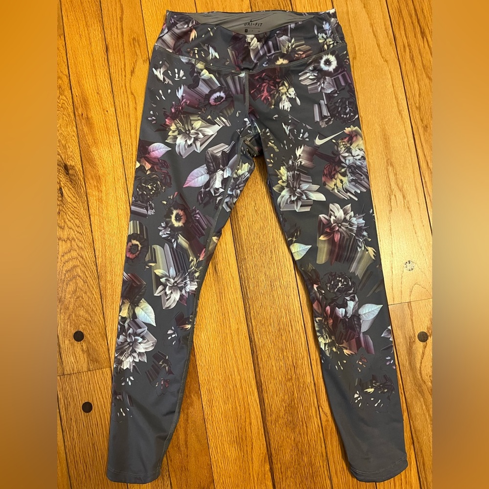 Nike Dri-Fit running tights, purple floral design, size small